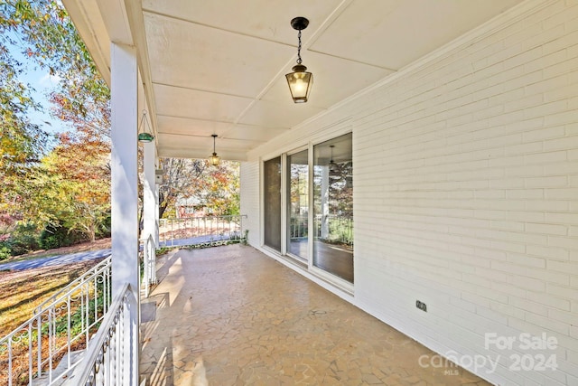 view of patio featuring a porch