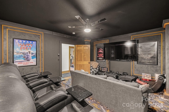 cinema room with ceiling fan