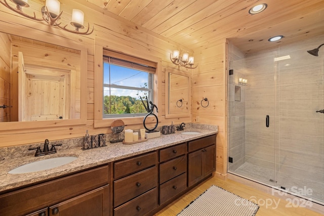 bathroom with hardwood / wood-style floors, wooden ceiling, vanity, an enclosed shower, and wooden walls