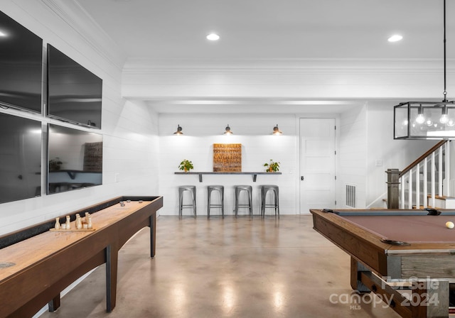 game room featuring crown molding, concrete floors, and billiards