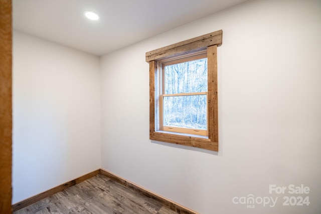 486 Hunter-Lysik Way, Laurel Springs, NC 28644 - empty room with baseboards, wood finished floors, and recessed lighting