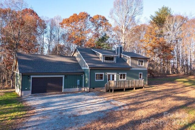 486 Hunter-Lysik Way, Laurel Springs, NC 28644 - view of front facade featuring a chimney, gravel driveway, an attached garage, crawl space, and a deck