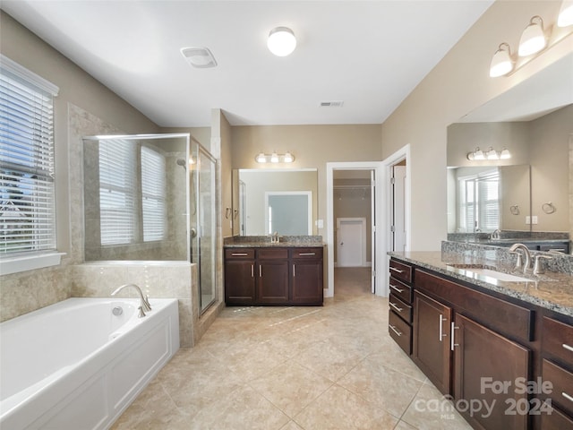 bathroom with vanity, separate shower and tub, and tile patterned flooring