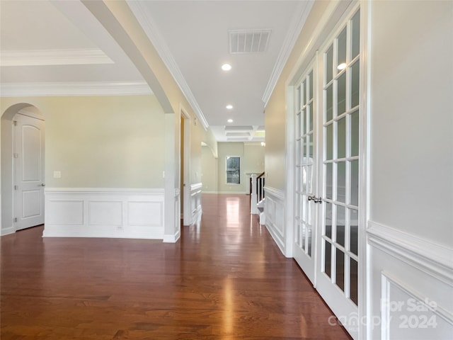 corridor featuring ornamental molding, dark wood-type flooring, and french doors