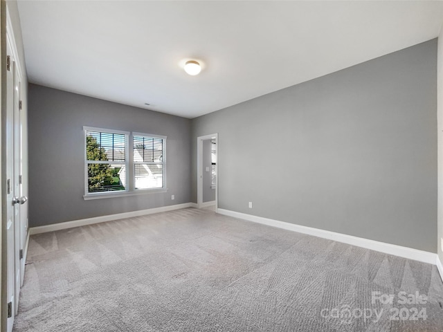 empty room featuring carpet floors