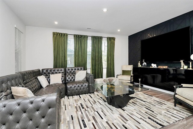 living room with light hardwood / wood-style floors