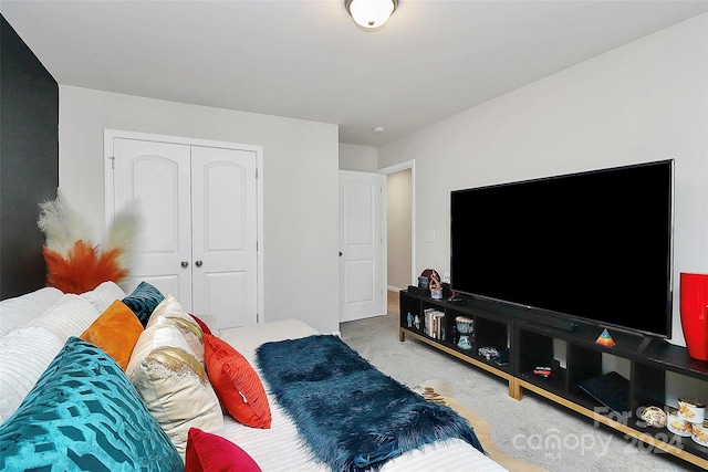 bedroom featuring a closet and carpet floors