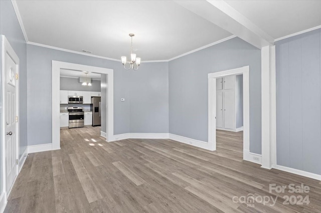 unfurnished dining area featuring light hardwood / wood-style floors, a notable chandelier, and ornamental molding