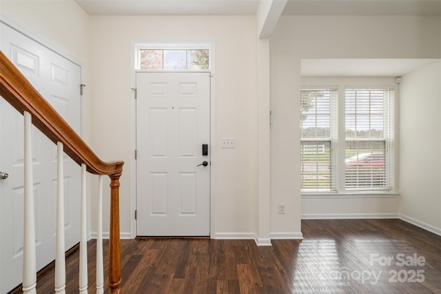 entrance foyer with dark wood-type flooring