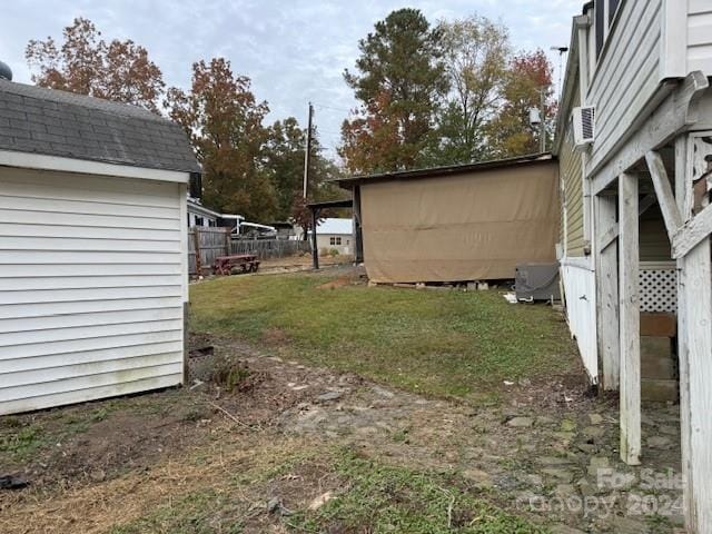 view of yard with a shed