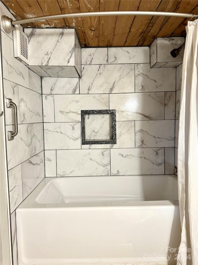 bathroom featuring wood ceiling and shower / bathtub combination with curtain