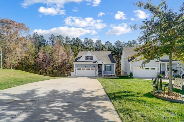 view of front of house with a front lawn and a garage