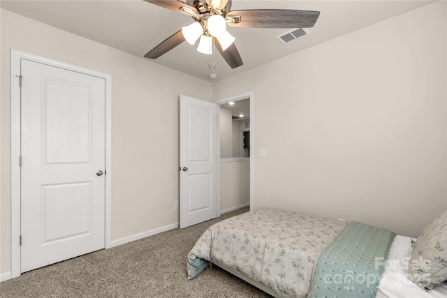 carpeted bedroom featuring ceiling fan