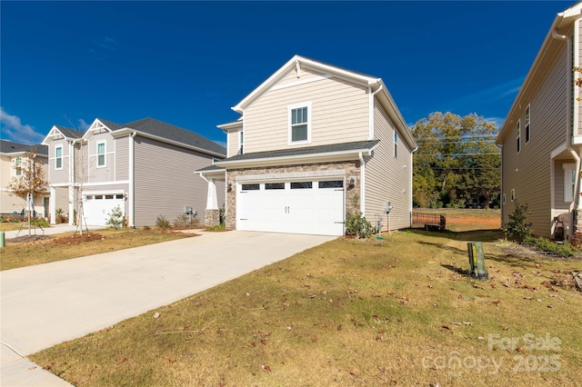 front facade featuring a front yard and a garage