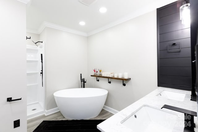 bathroom with hardwood / wood-style floors, vanity, shower with separate bathtub, and crown molding