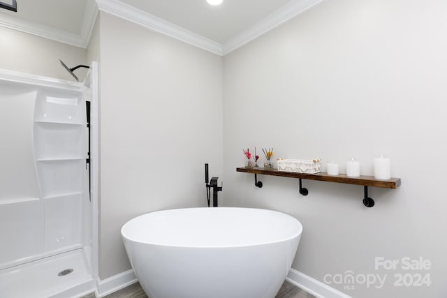 bathroom with independent shower and bath and ornamental molding