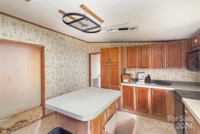 kitchen featuring black appliances, a textured ceiling, light tile patterned floors, a center island, and vaulted ceiling