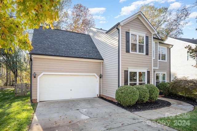 view of front of property featuring a garage