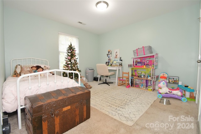 bedroom featuring carpet flooring