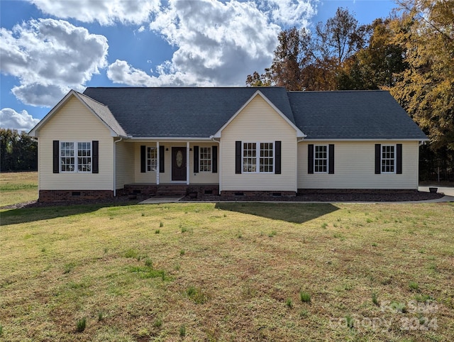 ranch-style house with a front yard