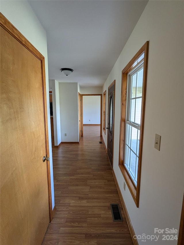 hall featuring dark hardwood / wood-style floors