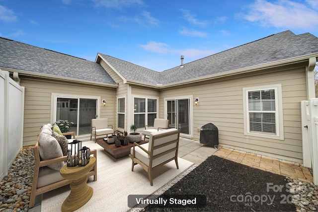 view of patio / terrace with an outdoor living space and area for grilling