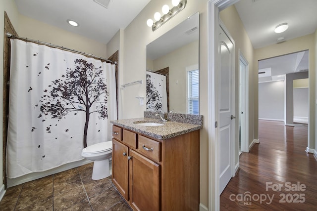 4919 Polo Gate Blvd, Charlotte, NC 28216 - full bath with toilet, vanity, and baseboards