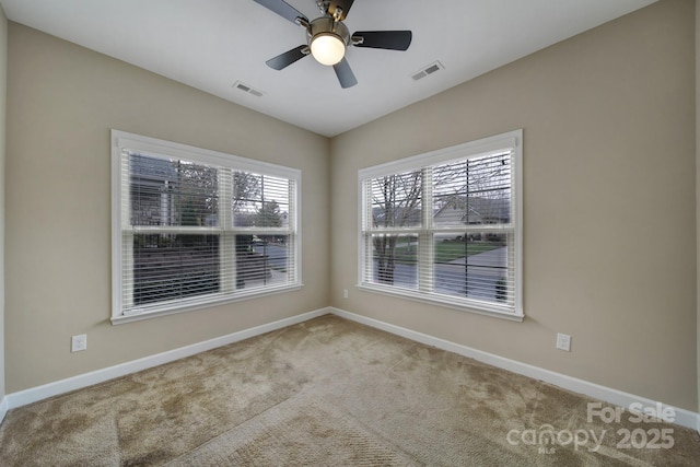 4919 Polo Gate Blvd, Charlotte, NC 28216 - unfurnished room featuring carpet, baseboards, and a ceiling fan