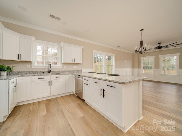 kitchen with ceiling fan, white cabinetry, dishwasher, and light stone counters