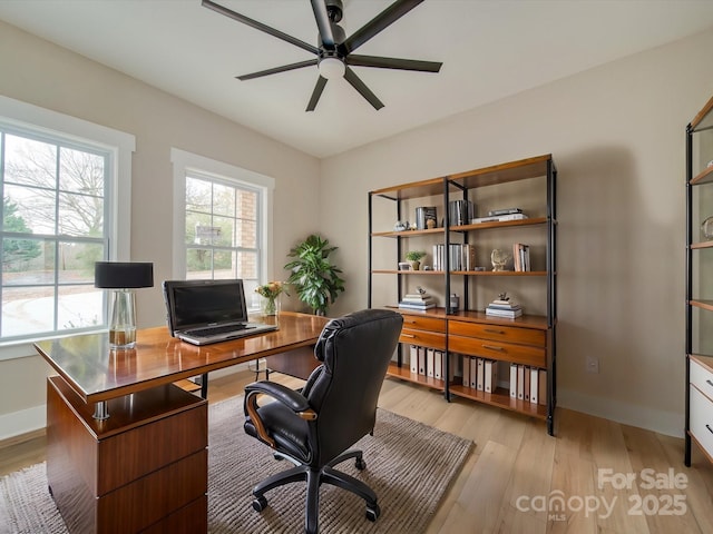 office area featuring ceiling fan and light hardwood / wood-style floors