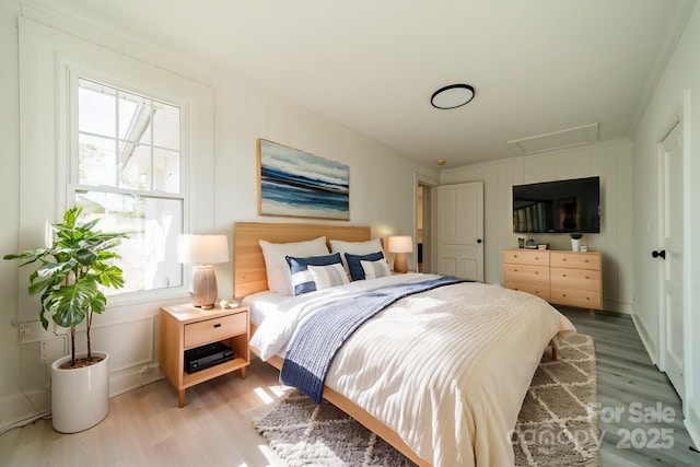 bedroom featuring light hardwood / wood-style floors