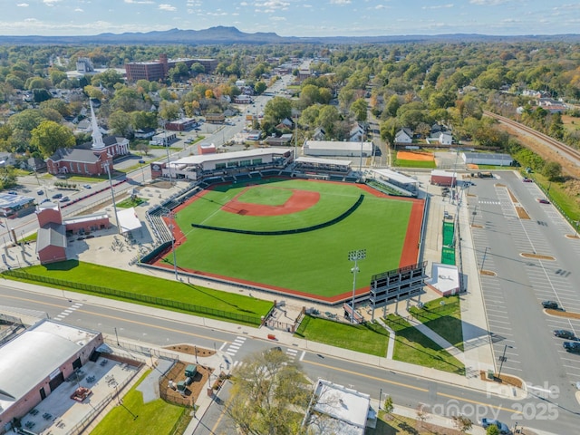 birds eye view of property featuring a mountain view