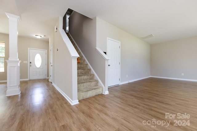 entryway with light hardwood / wood-style floors