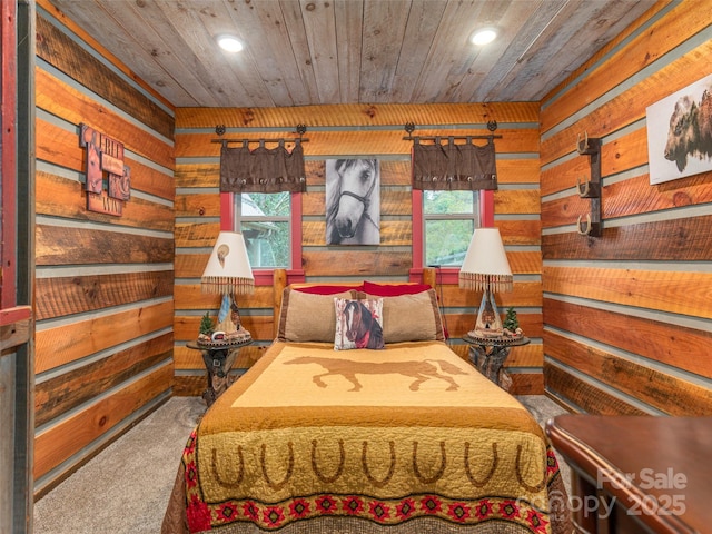 carpeted bedroom featuring recessed lighting, wood walls, and wood ceiling