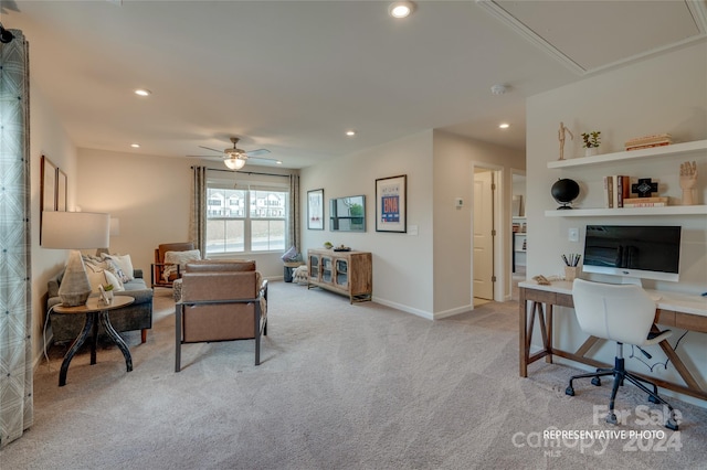 office with ceiling fan and light carpet