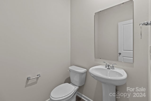 1403 Gentry Pl, Salisbury, NC 28146 - half bathroom with baseboards and toilet