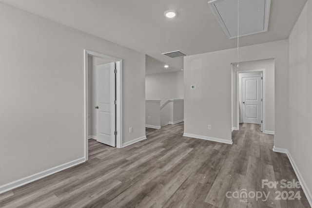 1403 Gentry Pl, Salisbury, NC 28146 - empty room with attic access, wood finished floors, baseboards, and recessed lighting