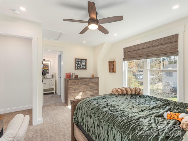 carpeted bedroom with ceiling fan