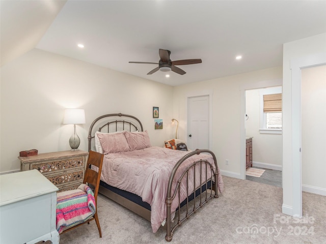 carpeted bedroom featuring ceiling fan