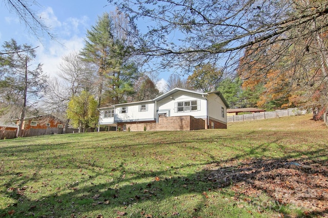 exterior space with a yard