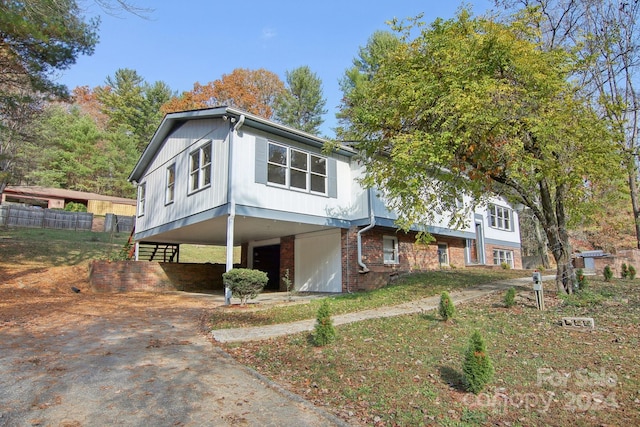 view of front of property with a carport