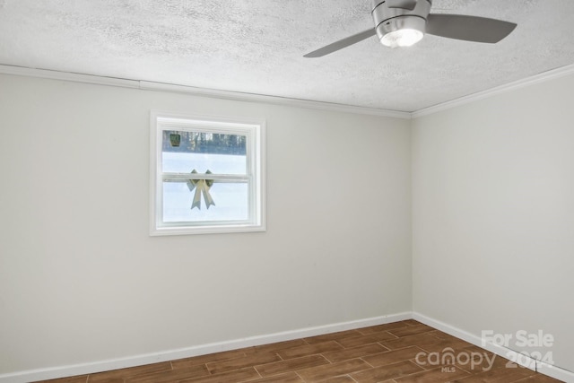 unfurnished room with a textured ceiling, ceiling fan, dark hardwood / wood-style floors, and ornamental molding