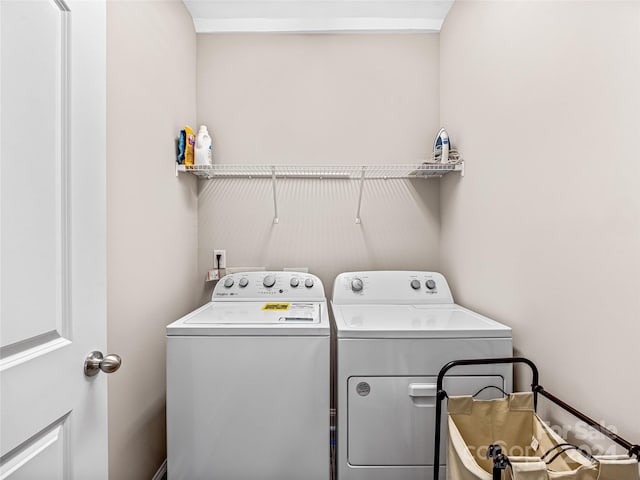 washroom featuring separate washer and dryer