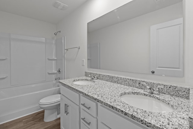 full bathroom with vanity, toilet, shower / bathing tub combination, and wood-type flooring