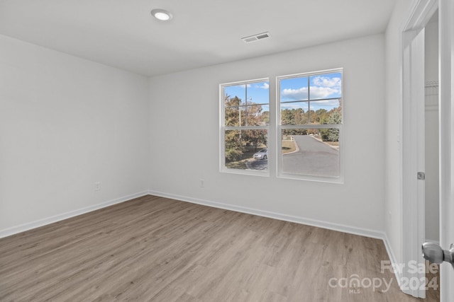 empty room with light wood-type flooring