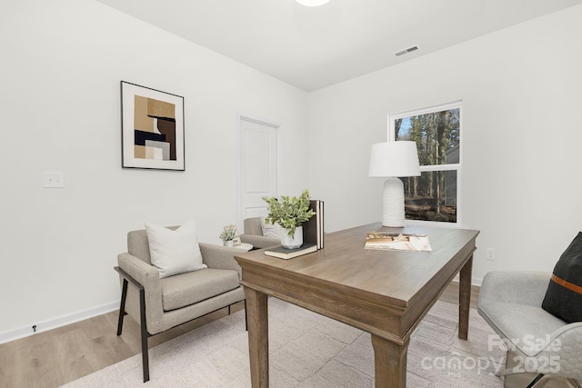 home office featuring light wood-type flooring