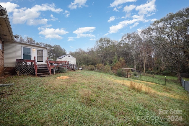 view of yard with a deck