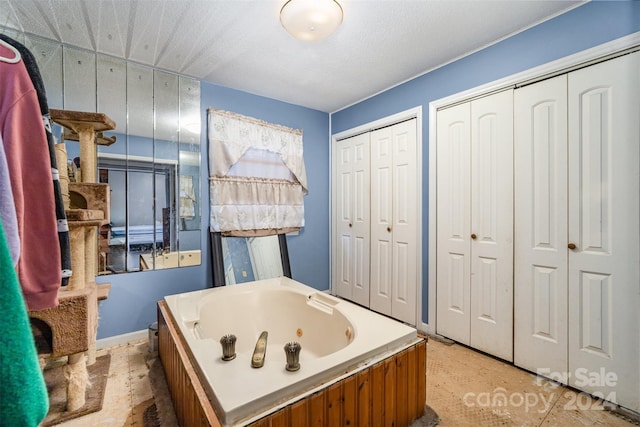 bathroom with a tub