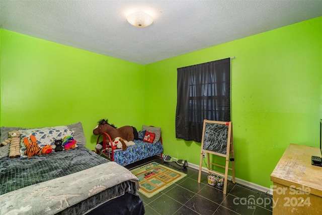 bedroom with a textured ceiling