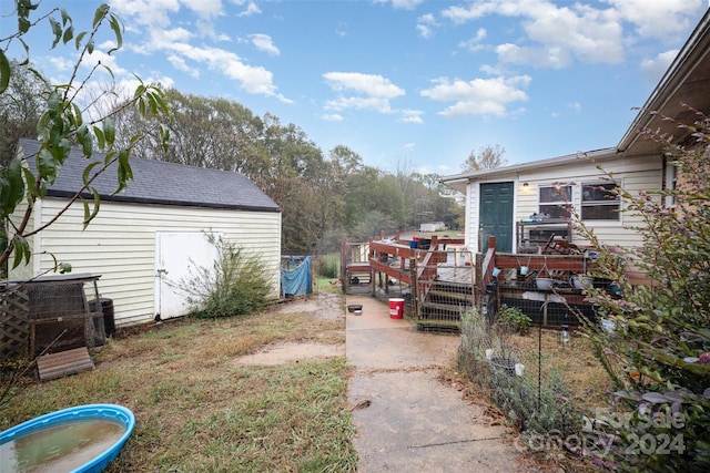 view of yard featuring a deck